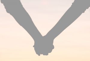 Couple holding hands